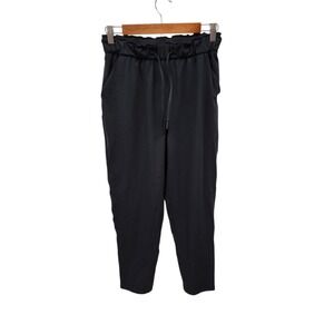 LULULEMON pants keep moving 7/8 high rise drawstring waist pockets ankle black 6